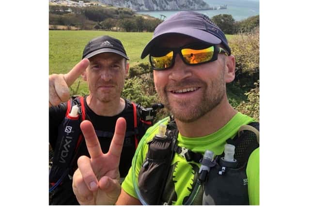 Matt Taylor and Niall Baker are taking on a 100-mile run along the South Downs Way to raise funds for Macmillan Cancer Care