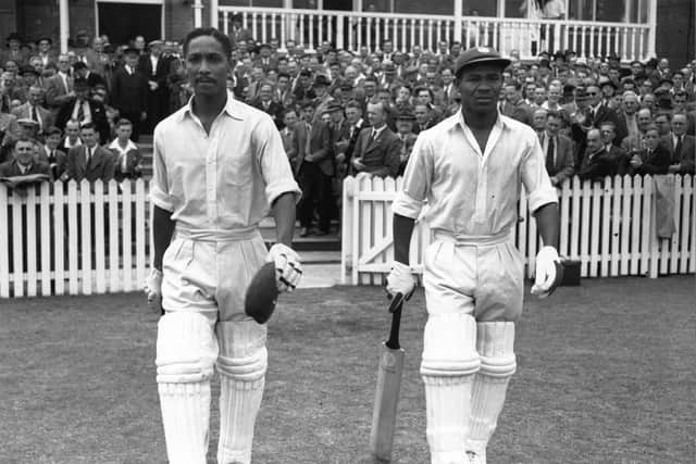 West Indies cricketers Everton Weekes, right, and Frank Worrell walk out to bat against England at Trent Bridge in 1950. Photo by Central Press/Getty Images.