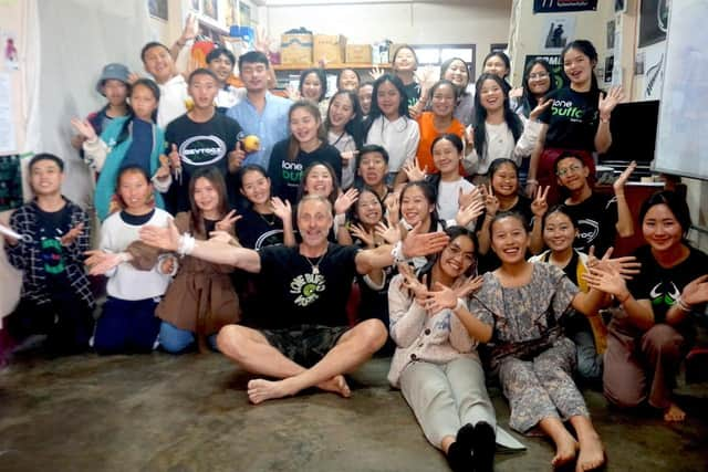 Mark Steadman (centre) with some of the students at Lone Buffalo