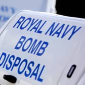 Images of Royal Navy Divers from the Southern dive unit at work. They demonstraited the kit they would use for underwater bomb disposal. This imagery is to be used to support the news stories of any ordinance found by the dredger in Portsmouth Harbour as it is being cleared for the arrival of the Queen Elizabeth Aircraft Carrier.