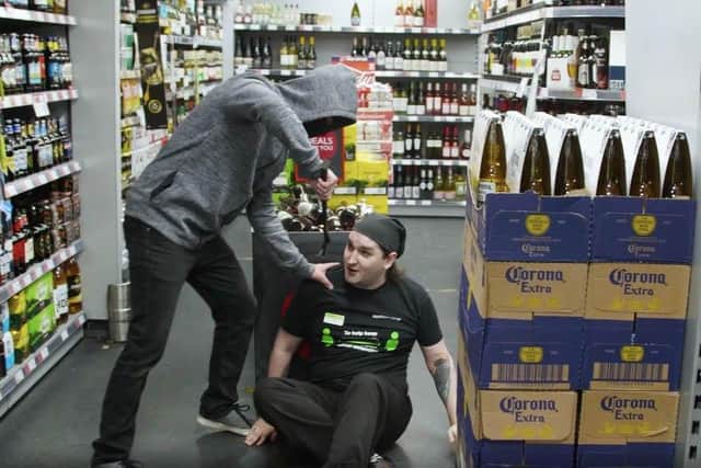 Still images from Co-op autumn/winter crackdown video on 14 October 2020. Pictured: Actors reenacting some of the devastating scenarios that some shop staff have faced in the past.