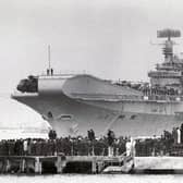 Falklands task force flagship HMS Hermes pulls away from her berth in Portsmouth Naval Base on April 5, 1982, bound for the South Atlantic.