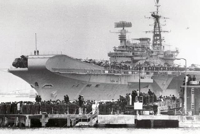 Falklands task force flagship HMS Hermes pulls away from her berth in Portsmouth Naval Base on April 5, 1982, bound for the South Atlantic.