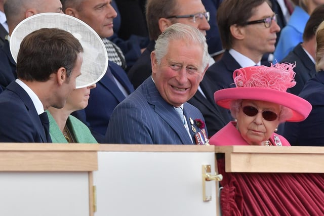 French President Emmanuel Macron, the then Prime Minister Theresa May, the then Prince Charles and Queen Elizabeth II attend an event to commemorate the 75th anniversary of the D-Day landings in Portsmouth on June 5, 2019