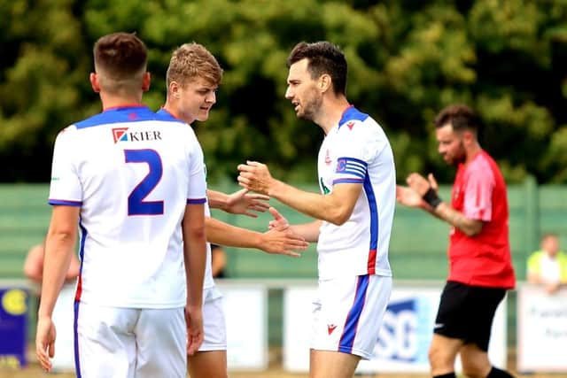 Matt Paterson, right, has just scored Gosport's third goal. Picture by Tom Phillips