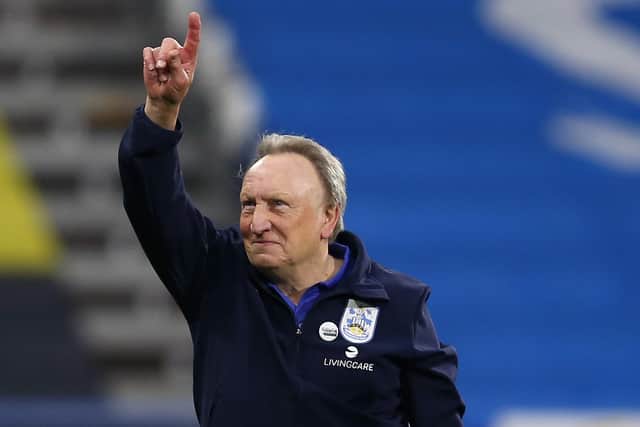 Neil Warnock celebrates after leading Huddersfield to a 2-1 win over Birmingham in his first match in charge. Picture: Ashley Allen/Getty Images