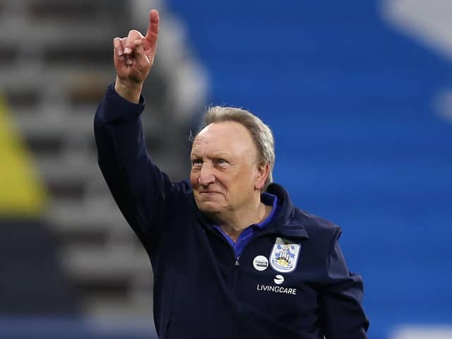 Neil Warnock celebrates after leading Huddersfield to a 2-1 win over Birmingham in his first match in charge. Picture: Ashley Allen/Getty Images