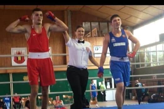 Mateusz Bereznicki, left, is crowned Polish senior elite heavyweight champion