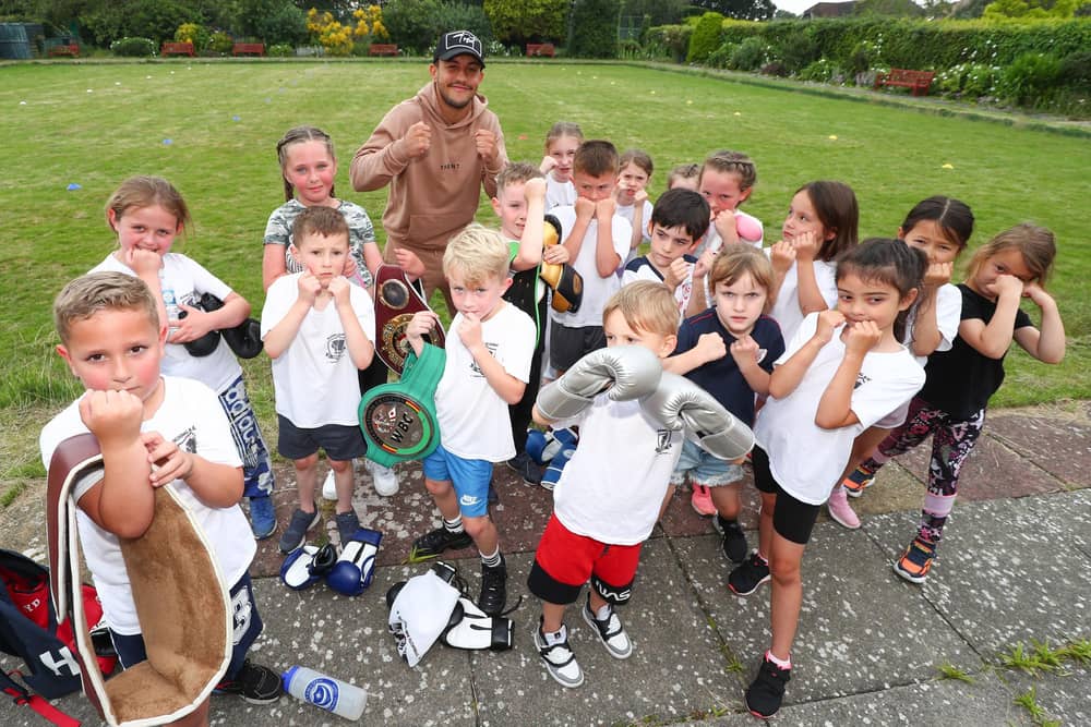 Mikey McKinson, furthest back, with some Heart of Hayling Boxing Academy youngsters. Picture: Stuart Martin (220421-7042)
