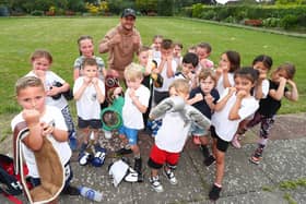 Mikey McKinson, furthest back, with some Heart of Hayling Boxing Academy youngsters. Picture: Stuart Martin (220421-7042)