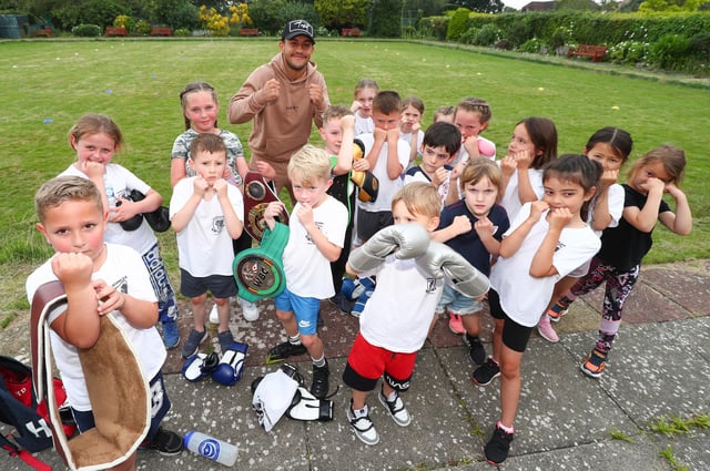 Mikey McKinson, furthest back, with some Heart of Hayling Boxing Academy youngsters. Picture: Stuart Martin (220421-7042)