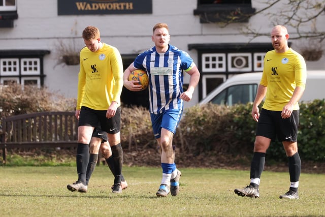 Wickham (blue/white) have just scored. Picture by Kevin Shipp