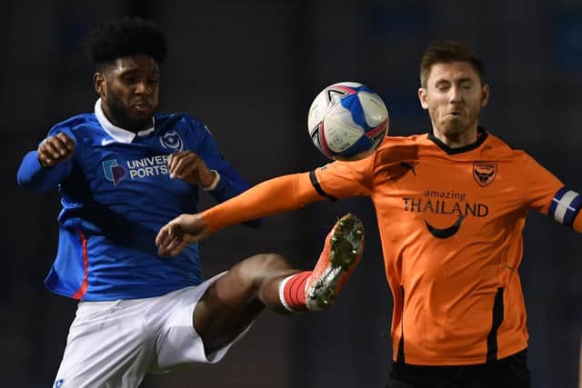 Pompey felt Oxford defender Elliott Moore should have been sent off for a foul on Ellis Harrison. Picture: Mike Hewitt/Getty Images