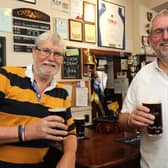 Bill Alderman, left, and Howard Davis enjoying the winter beer festival at the Rose In June pub, Milton Road.
Picture: Chris Moorhouse