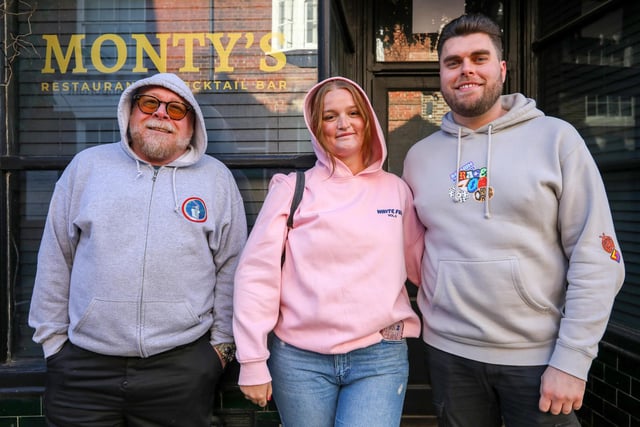 From left, Gavin Bowen, Mya Matthews and Kyle Needs in the queue. Record Store Day 2024 at Pie & Vinyl, Castle Road, Southsea.Picture: Chris  Moorhouse