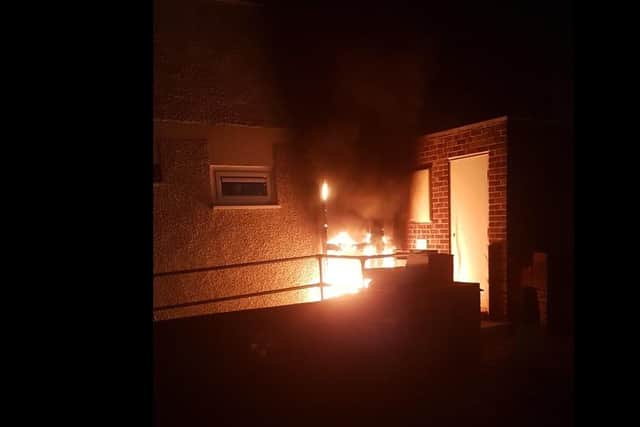 Police are investigating a fire that tore through the front of a property in Buckland around midnight yesterday.