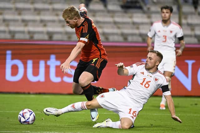 Joe Morrell cleanly wins the ball against Kevin De Bruyne in the Nations League in September. (Photo by LAURIE DIEFFEMBACQ / BELGA MAG / Belga via AFP) (Photo by LAURIE DIEFFEMBACQ/BELGA MAG/AFP via Getty Images)