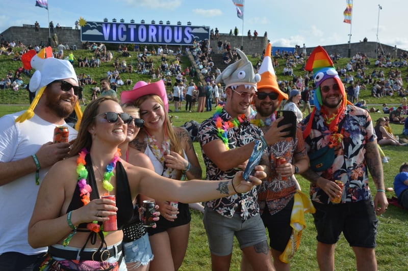 Festival-goers take a selfie in front of the Victorious sign at the Victorious Festival in Southsea, Hampshire. Picture date: Friday August 25, 2023. Pic: Ben Mitchell/PA Wire