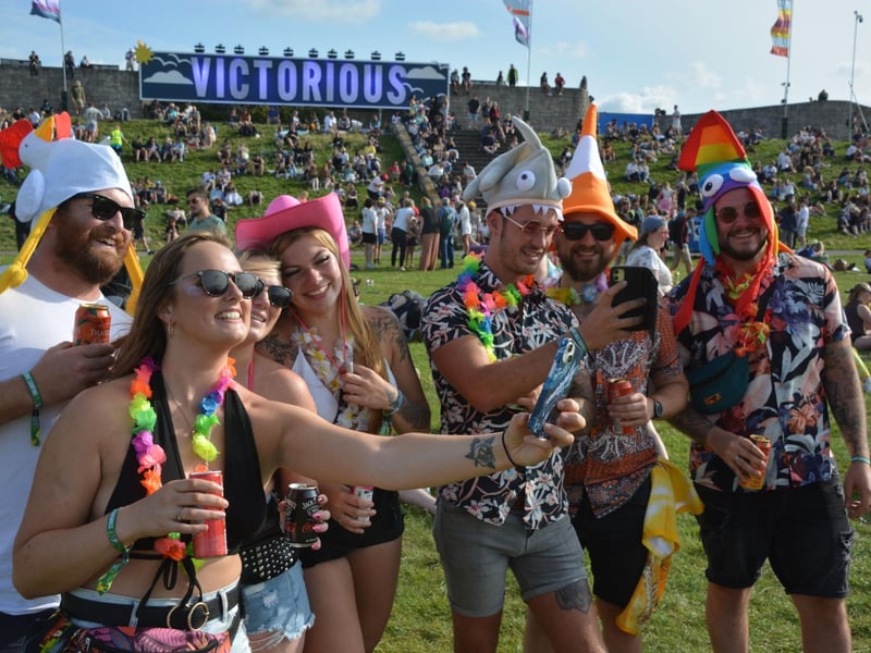 Festival-goers take a selfie in front of the Victorious sign at the Victorious Festival in Southsea, Hampshire. Picture date: Friday August 25, 2023. Pic: Ben Mitchell/PA Wire