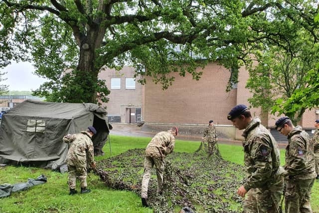 Cadets setting up a vehicle checkpoint