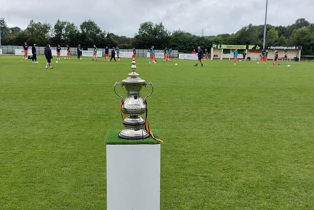 A replica FA Cup on show before the Portchester v Horndean tie.