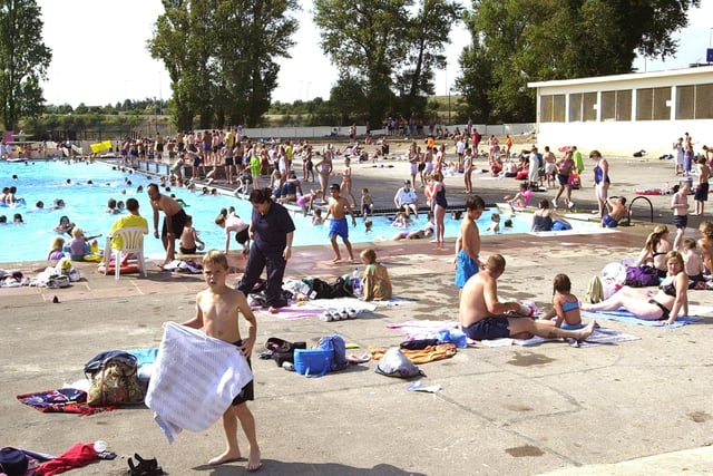 The crowds enjoy both the weather and the warm water at Hilsea Lido in 2010