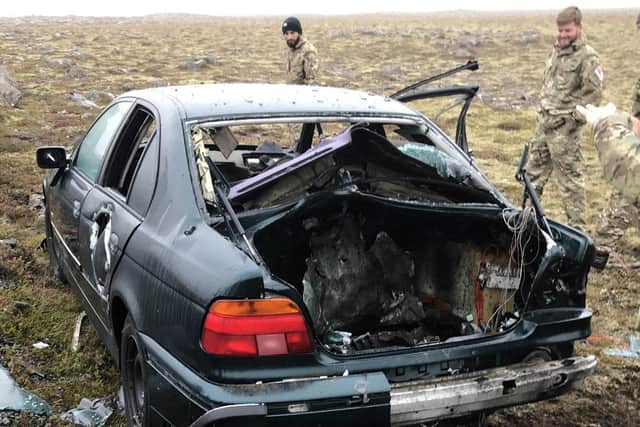Royal Navy divers also used their skills to safely deal with bombs hidden away in the boot of a car. Photo: Royal Navy