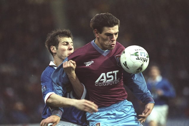 Dave Waterman tangles with Aston Villa's Savo Milosevic in an FA Cup Third Round replay at Villa Park as the Blues slip to a 1-0 defeat. Picture: Julian Herbert/Allsport