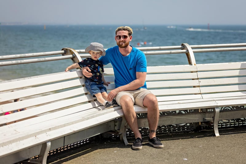 Lochlan (2.5) with dad Nick Brook (31) on South Parade Pier. Picture: Mike Cooter (110524)