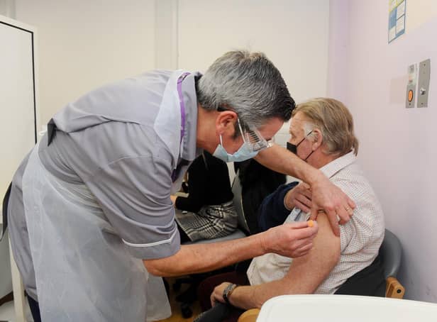 The Portsmouth NHS Covid-19 Vaccination Centre at Hamble House based at St James Hospital opened on Monday, February 1.Pictured is: David Senior (75) from Cosham, having his vaccination.Picture: Sarah Standing (010221-1959)