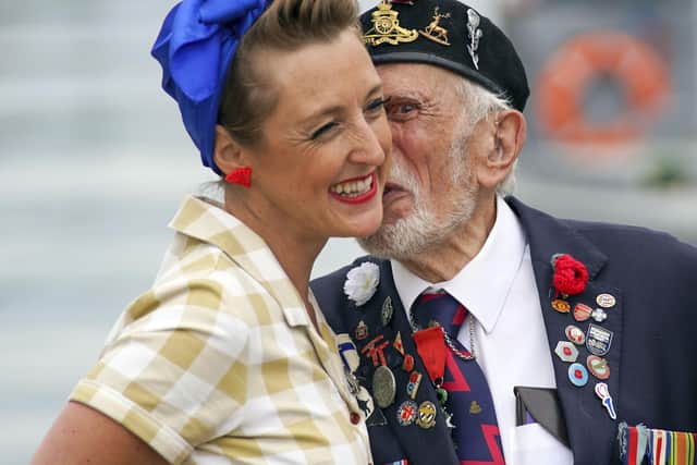 D-Day veteran Joe Cattini kisses a member of the Charlalas as he and other veterans are welcomed to the Portsmouth Historic Dockyard to commemorate the 77th anniversary of the Normandy Landings in 2021
Picture: Steve Parsons/PA Wire