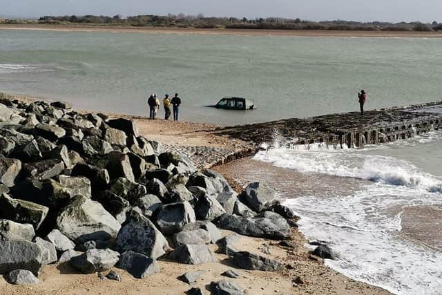 A Land Rover in Langstone Harbour. Portsmouth RNLI was called to the incident at 9.32am on Saturday, February 29. Picture: Joshua Boland