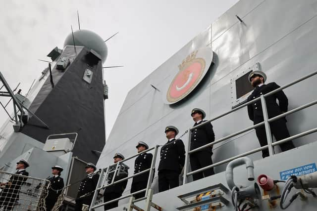 Pictured: Officer of HMS Duncan on the ships upperdeck during Procedure Alpha as the ship sails for deployment on SNMG2 on June 18, 2023. HMS Duncan will be the flagship for the SNMG2 task group led by Commodore Paul Stroude and his staff. Picture: PO Phot Lee Blease/Royal Navy.