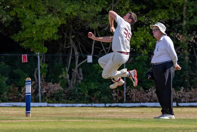 Gosport bowler Ollie Caswell leaps high in the air before delivering the ball at Portsmouth & Southsea. Picture: Mike Cooter