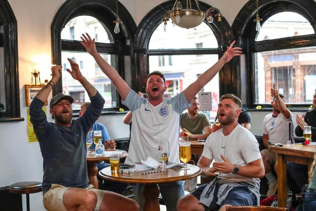 England fans watch England beat Germany 2-0 in the Euros 2020.
Fans pictured in The Kings pub celebrating on the final whistle.
Picture: Stuart Martin (220421-7042)