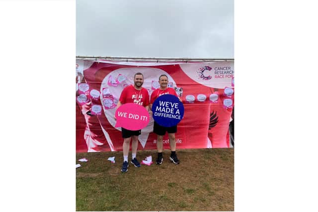 Josh (left) after taking part in the Race for Life