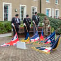 Standard lowered at the service in Gosport. Picture: Mike Cooter (121123)