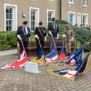 Standard lowered at the service in Gosport. Picture: Mike Cooter (121123)