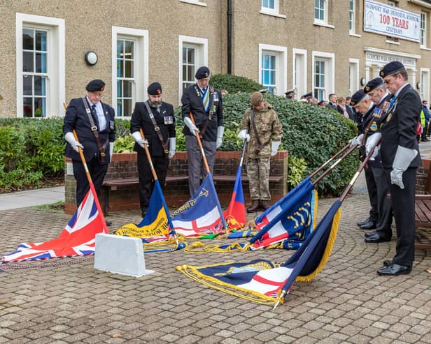 Standard lowered at the service in Gosport. Picture: Mike Cooter (121123)