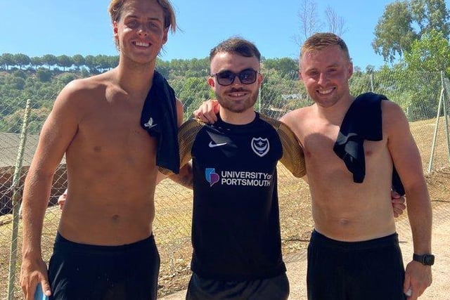 Fournilwrittenalloverit's Tom Chapman alongside Pompey players Ryley Towler and Joe Morrell at the team's La Cala Resort base in Malaga. Picture: @officialfournil