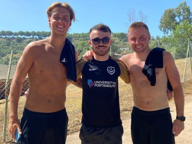 Fournilwrittenalloverit's Tom Chapman alongside Pompey players Ryley Towler and Joe Morrell at the team's La Cala Resort base in Malaga. Picture: @officialfournil