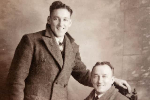A young Douglas with his father.