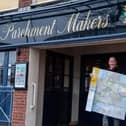 Steve Jones who has visited 460 Wetherspoons and plans to go to all of them during his retirement,  pictured outside The Parchment Makers Pub in Havant with his Map of the UK that he records his visits on. 

Picture by Emma Terracciano.