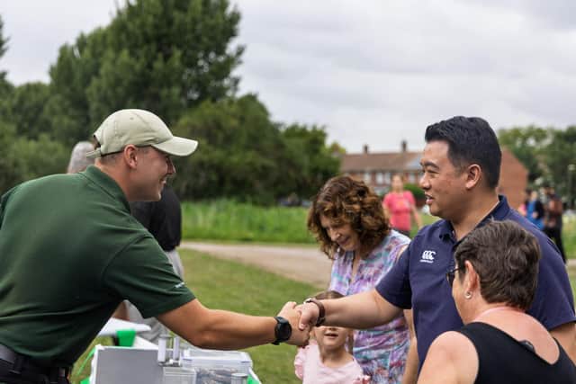 Alan Mak MP talks to one of the stallholders at the Summer Fun Day