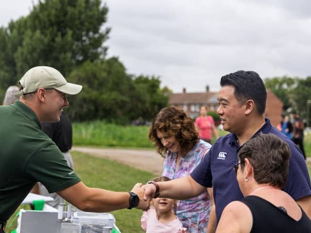 Alan Mak MP talks to one of the stallholders at the Summer Fun Day
