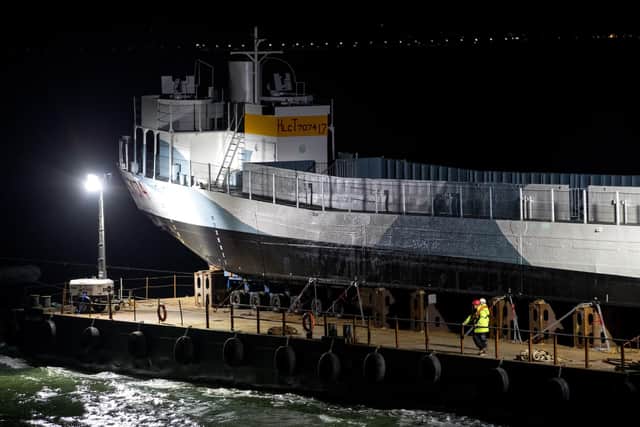 LCT 7074 passing the Round Tower in Old Portsmouth last night. Picture: Andrew Matthews/PA Wire