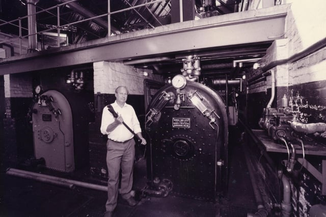 Leading attendant at Eastney Pumping Station showing some of the wartime period boilers used for an emergency steam supply. The News PP4671