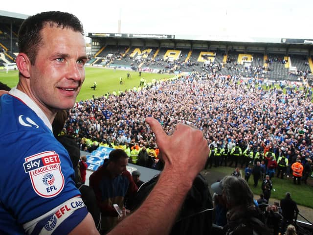 Michael Doyle celebrates Pompey's League Two promotion at Notts County. Picture: Joe Pepler