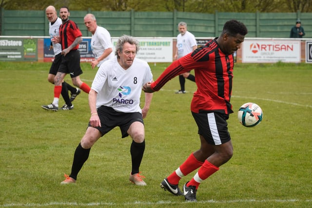 Action from the Jon Gittens memorial charity match between a team of former Fareham Town players and a side of ex-Pompey and Southampton professionals. Picture: Keith Woodland (160421-807)