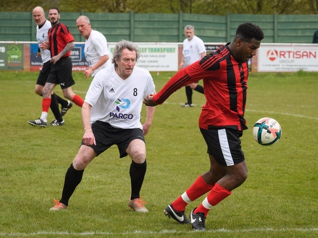 Action from the Jon Gittens memorial charity match between a team of former Fareham Town players and a side of ex-Pompey and Southampton professionals. Picture: Keith Woodland (160421-807)